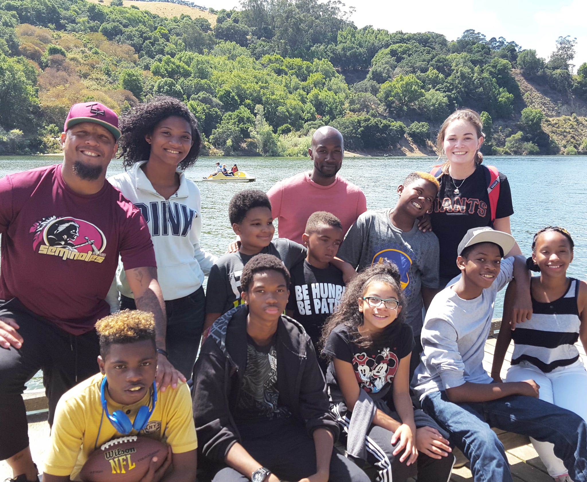 WELO youth and mentors together at a program event